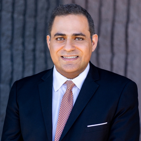 Rabin Saidian Personal Injury attorney wearing a suit and smiling into the camera.